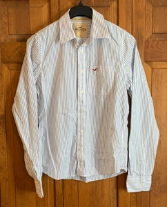 Camisa de algodón Hollister L/S para hombre con botones delanteros blancos con rayas azules etiqueta talla L - Imagen 1 de 4