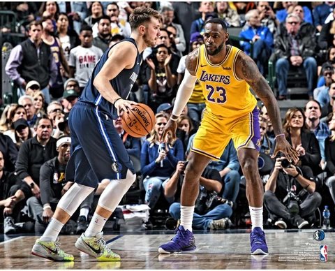 Luka Doncic Dallas Mavericks Unsigned Dribbling vs. LeBron James Photograph Cover