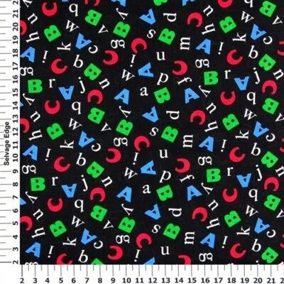 1 1/6 Yard W Back To School Cotton Fabric - Color Alphabets tossed Black Fabric - Image 1 of 4