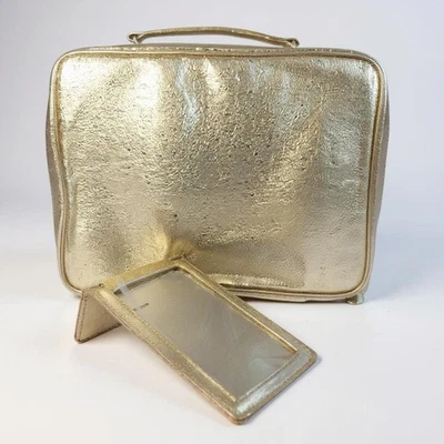 Maleta blanda con espejo tren viaje maquillaje cosmético dorado de Estee Lauder Foto 1 de 4