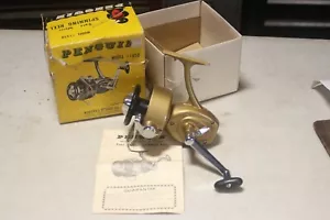 Carrete giratorio de agua salada Penguin 105D vintage en caja con papeleo - Imagen 1 de 21