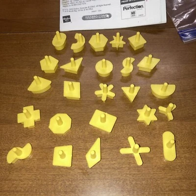 Perfection 2003 Game Pieces Parts 25 Yellow Pegs Shapes Hasbro Complete Set - Image 1 of 2