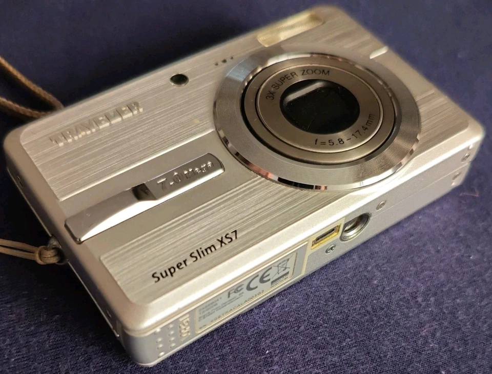 Traveler Super Slim XS7 7.0MP Compact Digital Camera Silver +2GB SD Karte +Hülle - Bild 1 von 4