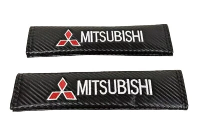 Juego de almohadillas de hombro cubiertas de cinturón de seguridad bordadas con aspecto de carbono negro para MITSUBISHI Foto 1 de 2
