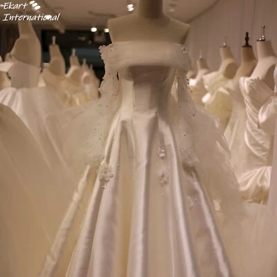 Elegant Off Shoulder 3D Flowers Pearls Satin Wedding Dress Long Sleeves Arabic - Image 1 of 4