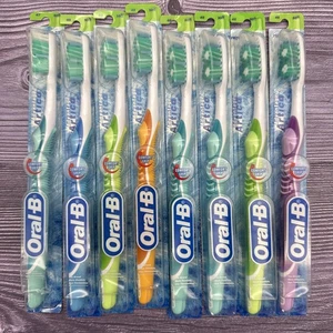 8 LOT Oral-B Advantage ARTICA Soft 40 Toothbrush Regular (48) Indicator Bristles - Picture 1 of 10