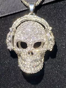 BETSEY JOHNSON A SILVER PENDANT CRYSTAL ENCRUSTED SKULL WITH HEADPHONES - Picture 1 of 14