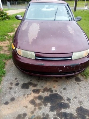 2000 Saturn LS2 3.0 L 4 door sedan burgundy  - Image 1 of 4