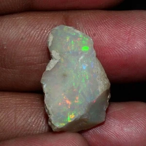 Piedra preciosa suelta de ópalo etíope natural de 17,50 quilates de grado superior áspera juego de colores - Imagen 1 de 10