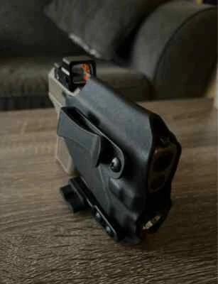 FUNDA CANIK TP9 NEGRA CON OLIGHT  Foto 1 de 4