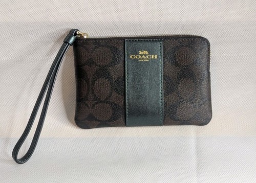 Polsino Coach con zip angolare in tela di noce verde firmato