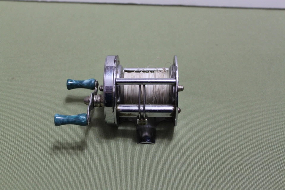 Carrete de pesca vintage Abbey Imbrie junto al lago EE. UU. mango verde azulado antiguo Foto 1 de 4