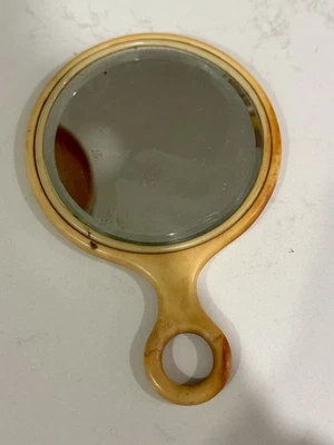 Vintage Celluloid Ivory Hand Mirror with Loop Handle Beveled Glass - Image 1 of 4