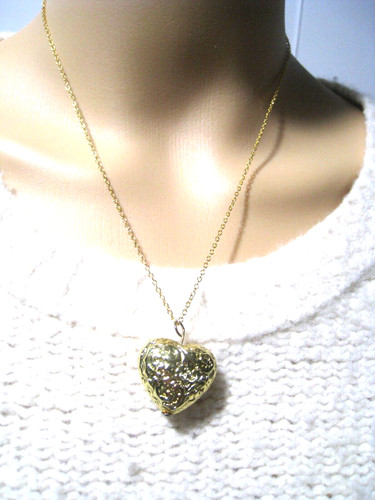 VETEMENTS Collana con ciondolo piccolo tondo 3D cuore testurizzato tono oro moda