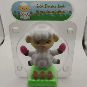 Tanzendes Lamm mit Zaun im Paket mit zwei roten Kugeln Wackel solarbetrieben  - Bild 1 von 4