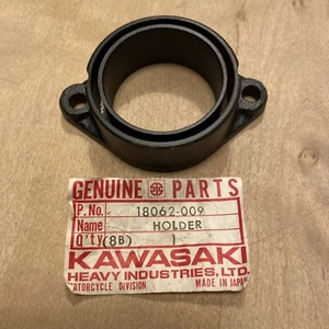 Supporto scarico originale Kawasaki KX125 1974-1979 18062-009 NOS - Foto 1 di 3