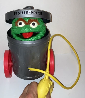 Juguete emergente Oscar The Grouch 1977 Fisher Price Plaza Sésamo Foto 1 de 4