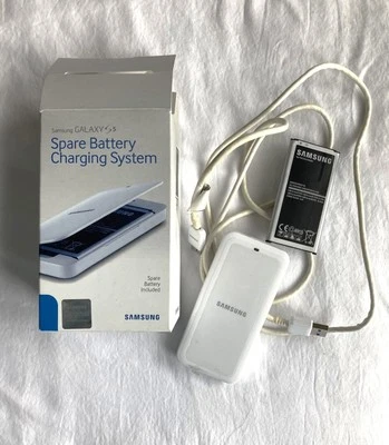 Batería de repuesto y cargador Samsung Galaxy S5 como está Foto 1 de 4