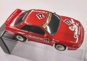 Tomy AFX TCA9801 NISSAN GTR #12 Calsonic Iluminado con Coche Ranura Sparker NUEVO-RARO - Imagen 1 de 7