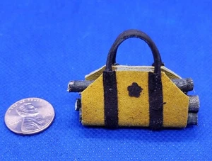 Dollhouse Miniature Brown on Yellow/Tan Leather Log Carrier -- 1:12 Scale  - Picture 1 of 2