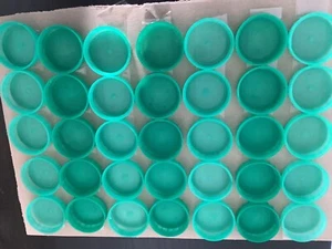 35 used green milk flagon tops for crafting - Picture 1 of 4