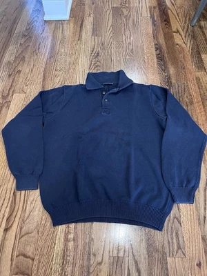 Suéter polo tejido Brandy Melville para mujer con cuello abotonado preppy azul marino Foto 1 de 4
