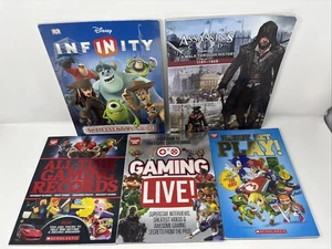 Lot of 5 Video Game Books Schoolastic Assasins Creed Streaming Disney Mario - Picture 1 of 12