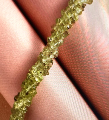 Peridot Chips Twisted Bracelet in Platinum Over Sterling Silver (7.25 In) 71.15 - Image 1 of 4