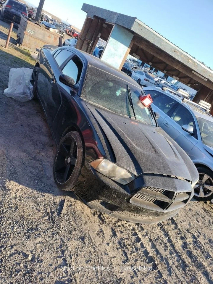 INTERRUPTOR DE ENCENDIDO CARGADOR DODGE 2011-2014 Foto 1 de 4