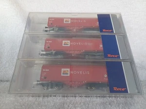Roco HO Gauge 76095 Sliding Tarpaulin Wagons Shimms Type NOVELIS Triple Pack Set - Picture 1 of 12
