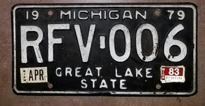 1979 MICHIGAN LICENSE PLATE RFV-006 BLACK & WHITE W 1983 APRIL STICKER TAGS - Picture 1 of 2