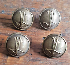 Four unidentified, possibly military, buttons depicting a crossbow or arbalest
