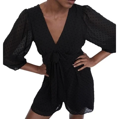 Mameluco Zara para mujer grande negro punto suizo mangas largas transparentes cuello en V moño acento  Foto 1 de 4