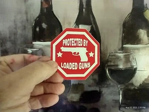 Small Hand made Decal Sticker PROTECTED BY LOADED GUNS - Picture 1 of 3