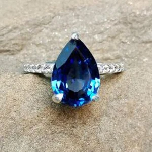 2.1CTW Pear Cut Lab Created Blue Sapphire Hidden Halo Ring 14K White Gold Plated - Picture 1 of 18