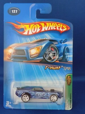 Ford Mustang Mach 1 2005 Treasure Hunt 1970 azul 5 radios pilotos reales Hot Wheels Foto 1 de 3