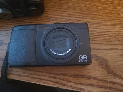 Cámara digital Ricoh GR Digital IV 10,1 MP - negra Foto 1 de 4