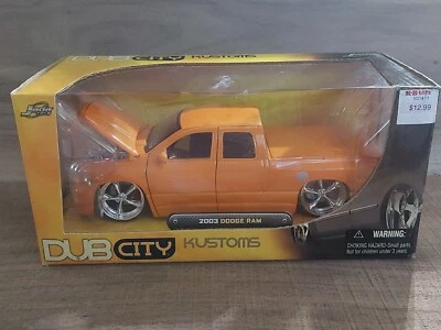 Dub City Kustoms 1:24 2003 Dodge Ram Quad Cab Pickup Die-Cast KMC Orange NIB - Image 1 of 4