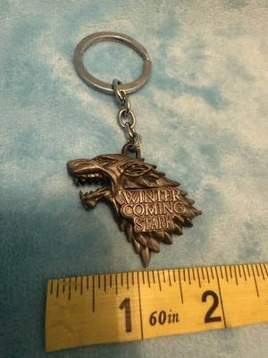 GAME OF THRONES WOLF Statuina Portachiavi L'inverno sta arrivando da collezione John Stark - Immagine 1 di 4