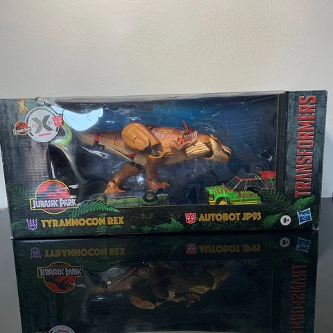 Transformers Collaboration: Jurassic Park Mash-Up TYRANNOCON REX & AUTOBOT JP93 Cover