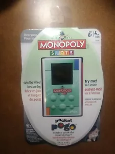 Monopoly SLOTS Pocket Pogo Electronic game  NEW - Picture 1 of 2
