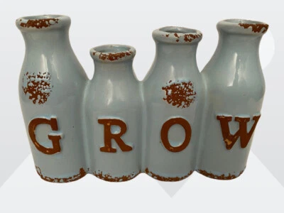 Florero de cerámica vintage azul y marrón con botella conectada novedad crecimiento de espelta Foto 1 de 4