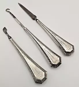 HERMOSAS TRES HERRAMIENTAS DE MANICURA ART DECO VINTAGE CON MANGO PLATEADO c1930 g - Imagen 1 de 11