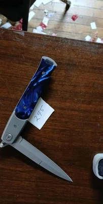 cuchillo plegable Foto 1 de 2