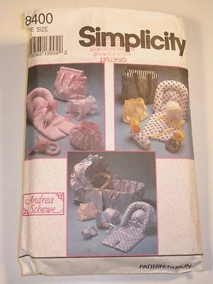 S-8400 Diaper Cover Bottle Cover Rattle Hat Sewing Pattern Simplicity  - Image 1 of 4