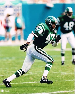 NEW YORK JETS RONNIE LOTT UNSIGNED GLOSSY 8 X 10 PHOTO - Picture 1 of 1