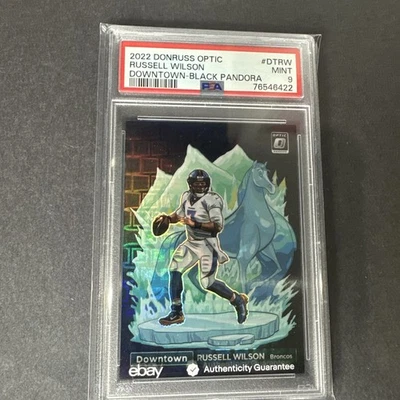 Panini Donruss Optic Downtown Russell Wilson 2022 #DT-RW negro Pandora Prizm/25 Foto 1 de 3