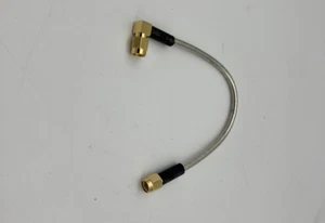 SMA Right Angle male to SMA male RG402 50 ohm Semi-rigid coax cable - Picture 1 of 3