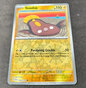 Pokemon Surging Sparks Stunfisk Reverse Holo Common Card 064/191 NM - Picture 1 of 1