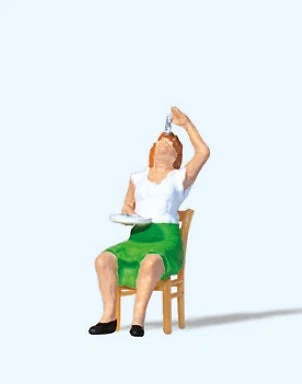 Preiser 28261 HO Woman Sitting on Chair Eating Fish - Image 1 of 1